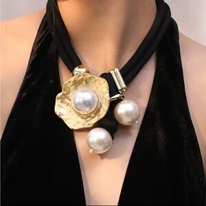 Elegant Gold and Black Pearl Necklace